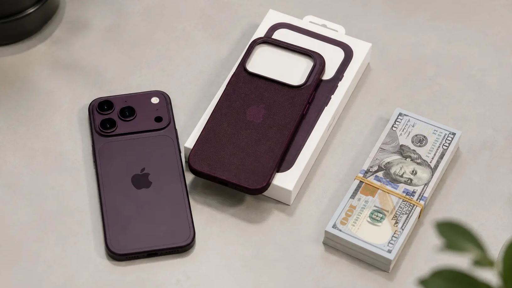 Бордовый iPhone 18 Pro, коробка с чехлом и пачка долларов