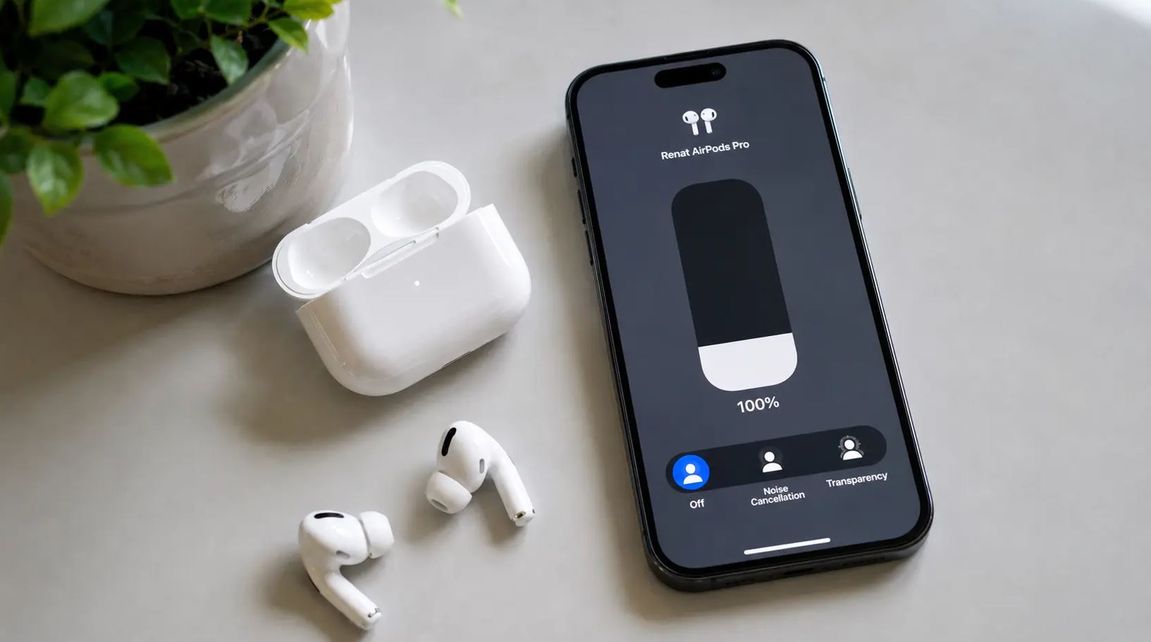 AirPods рядом с зарядным футляром и подключённым iPhone